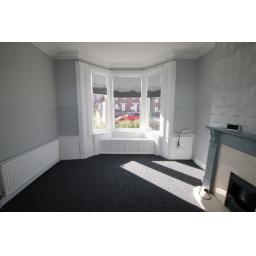 High yielding property in the North East – Refurbished lounge window.jpg