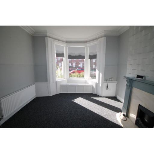 High yielding property in the North East – Refurbished lounge window.jpg